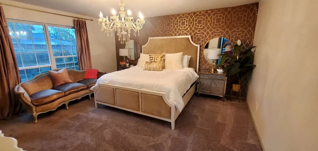 Beautifully staged living room with neutral decor, bright lighting, and an open, inviting layout that highlights the home’s best features.